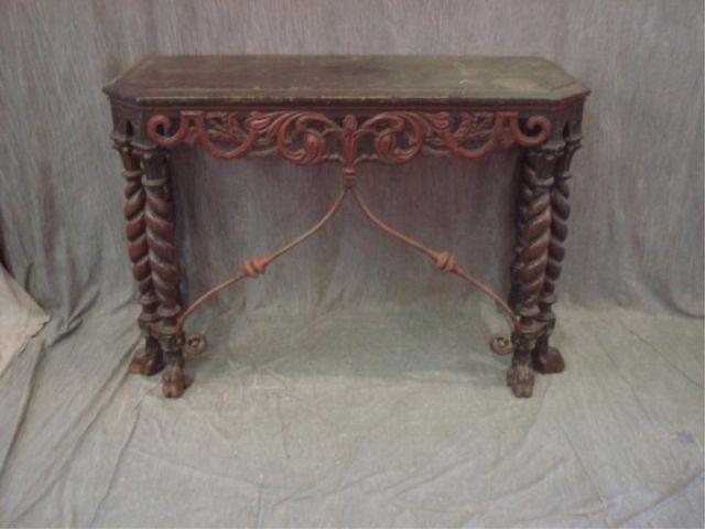 Appraisal: Spanish Style Paw Foot Console with Metal Stretchers From a