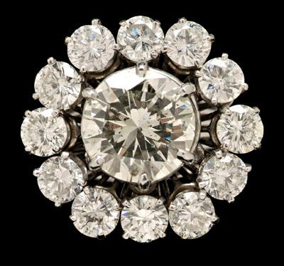 Appraisal: ct floral diamond ring central round brilliant-cut diamond estimated weight