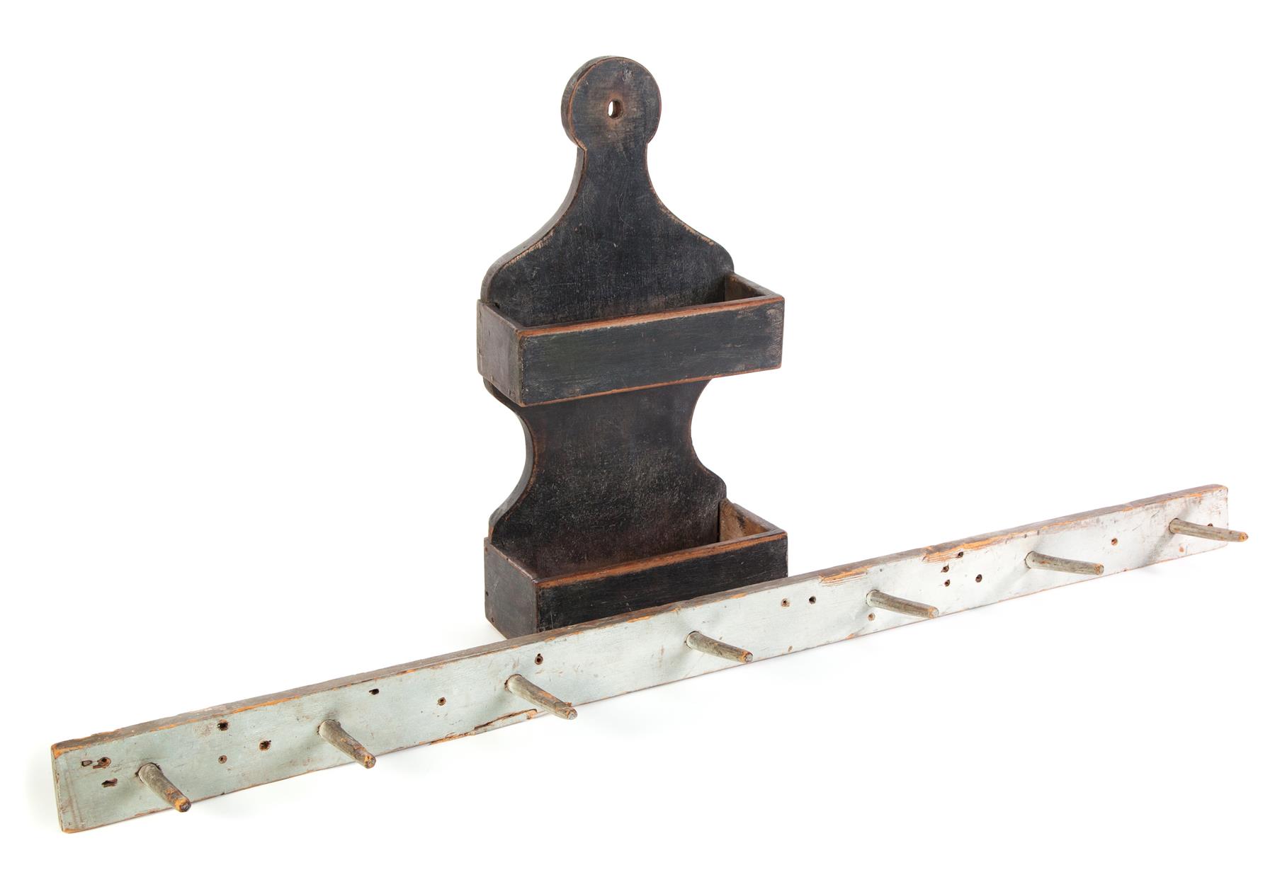 Appraisal: AMERICAN WALL POCKET AND PEG RAIL Nineteenth century Poplar hanging