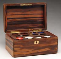 Appraisal: EARLY ROSEWOOD CASED POKER CHIP SET The hinged solid rosewood