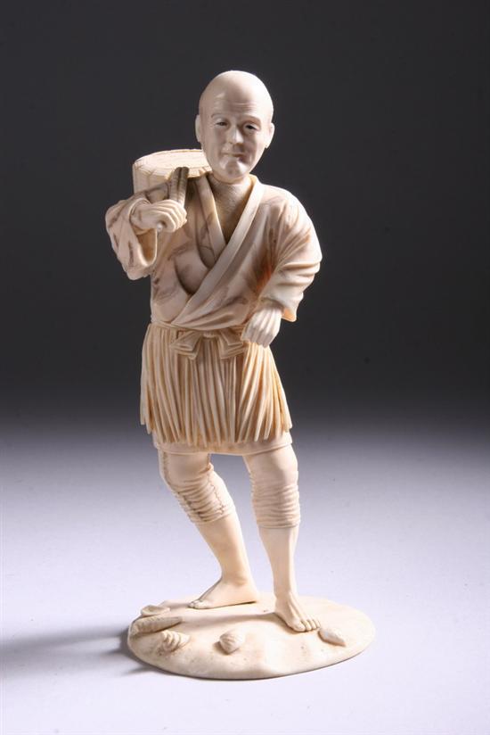 Appraisal: JAPANESE IVORY OKIMONO OF FISHERMAN th century Carved standing on