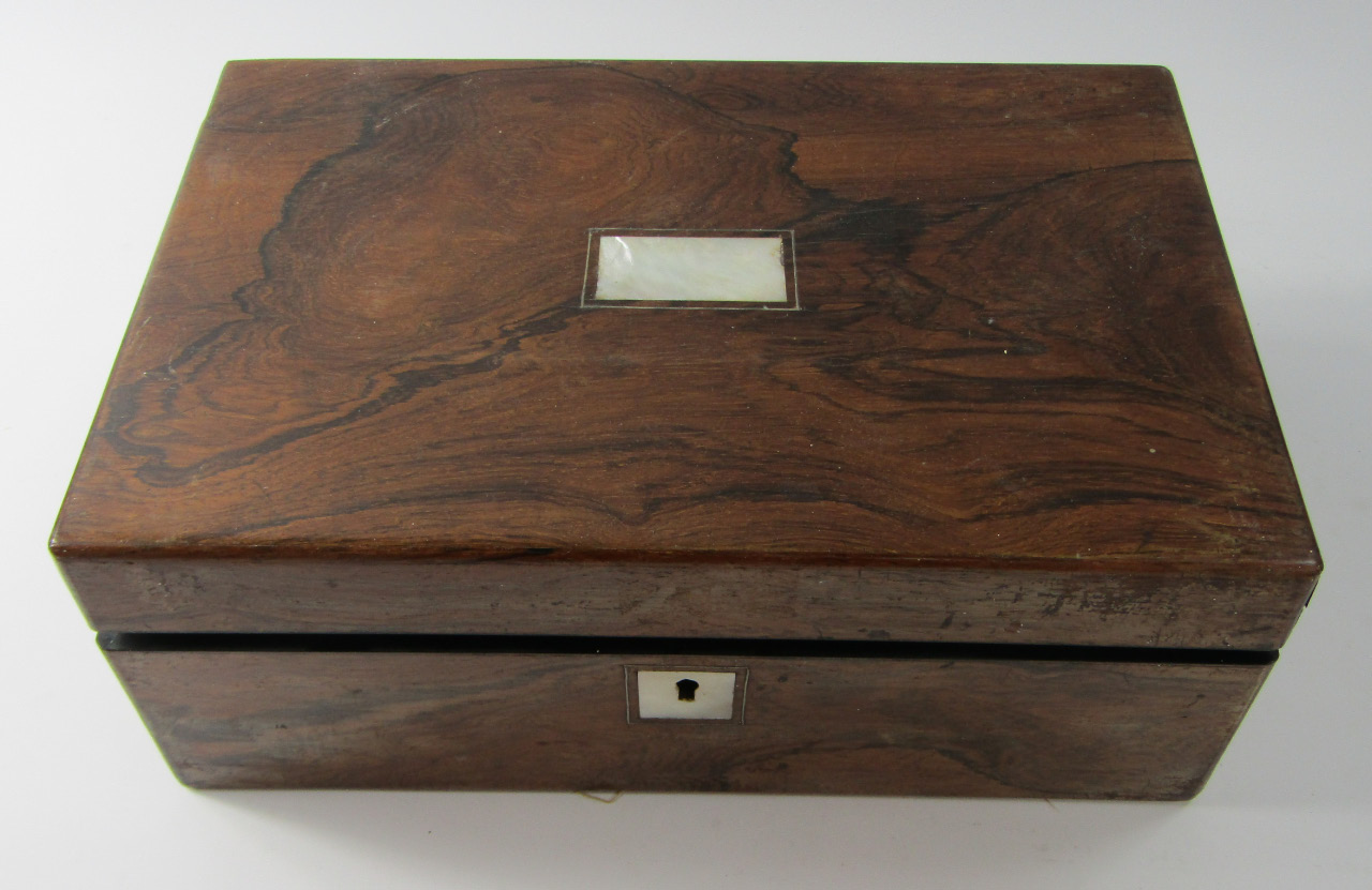 Appraisal: A Victorian rosewood and mother of pearl inlaid writing slope