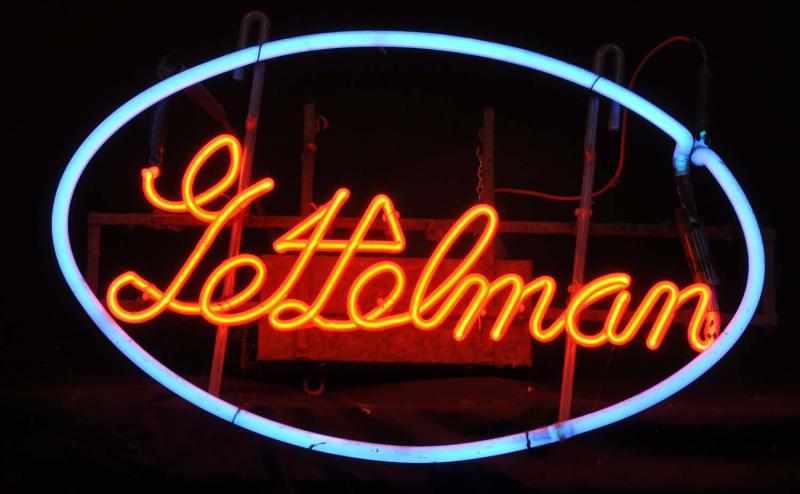 Appraisal: Gettleman Neon Sign Description s Red and blue neon mounted