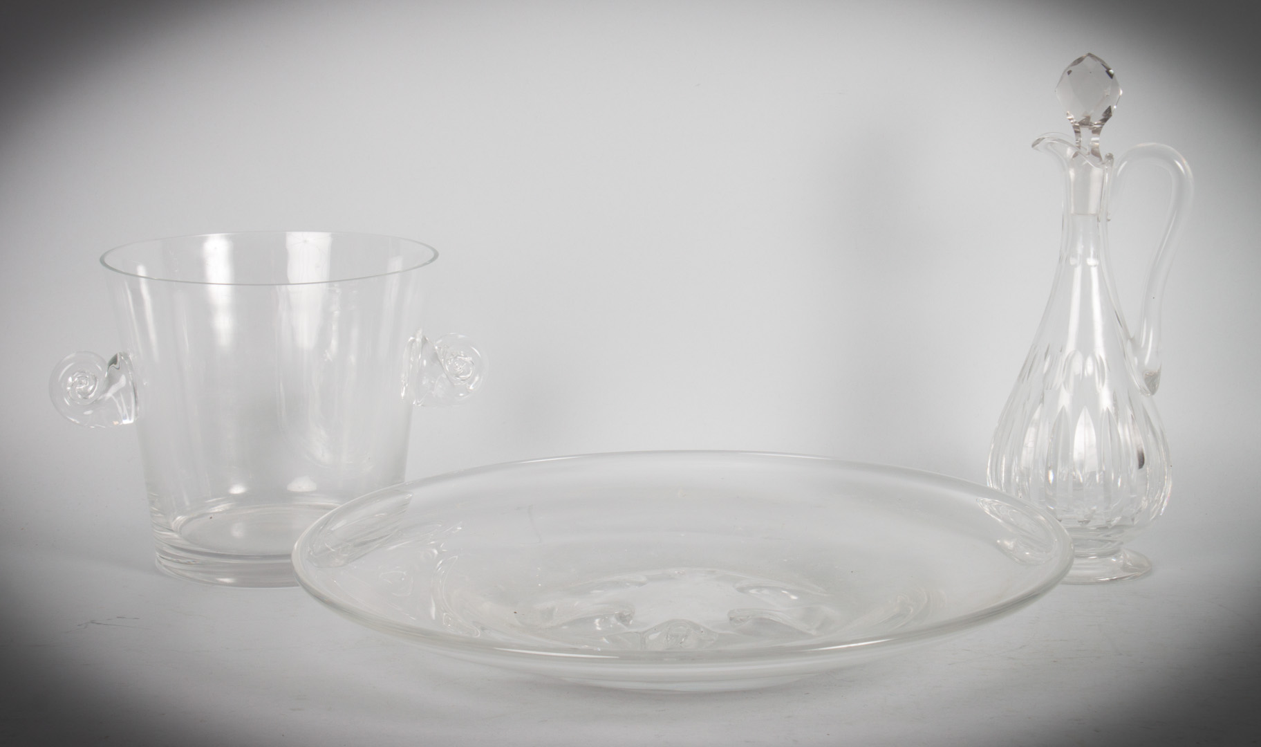 Appraisal: Three colorless art glass articles including Baccarat ewer Tiffany double-handled