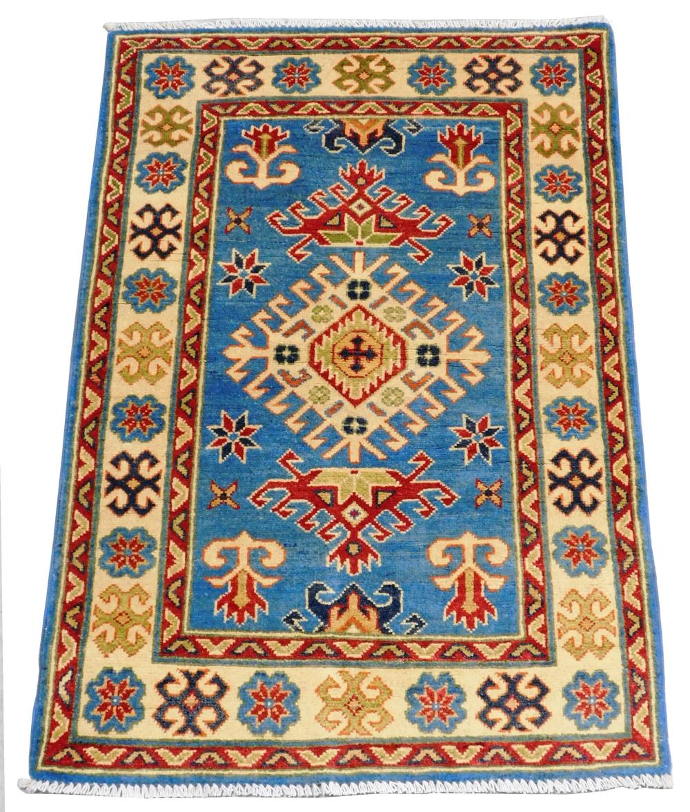 Appraisal: RUG Uzbek Kazak ' x ' hand-made wool polychrome with