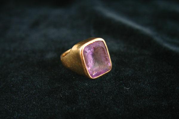 Appraisal: A ct gold Seal Ring with large rectangular amethyst having