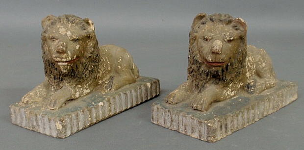 Appraisal: Pair of recumbent sewer tile lions h x w x