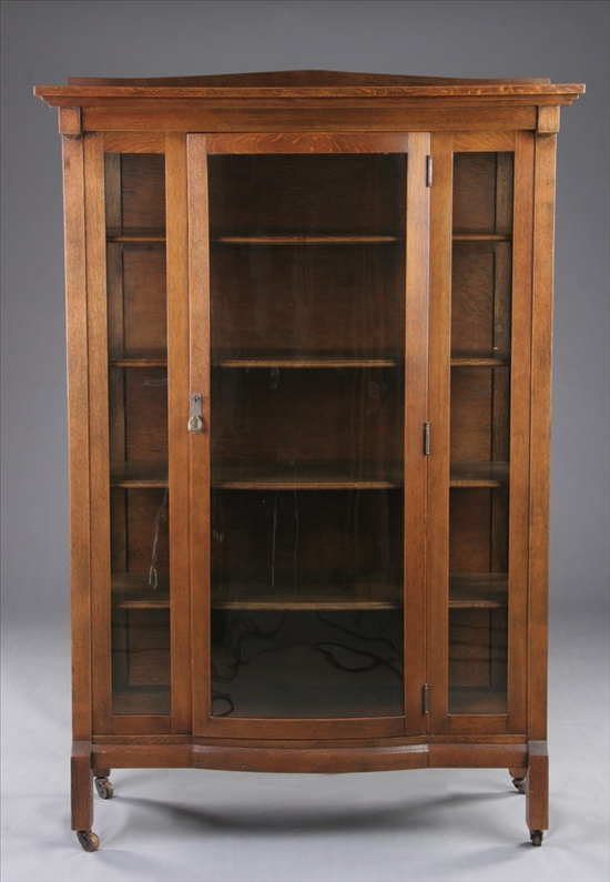 Appraisal: AMERICAN MISSION STYLE OAK CHINA CABINET Early th century with