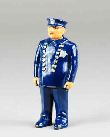 Appraisal: POLICEMAN STILL BANK Arcade cast iron full figure depiction in