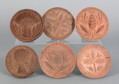 Appraisal: Six pineapple sheaf of wheat and floral carved buttermolds th