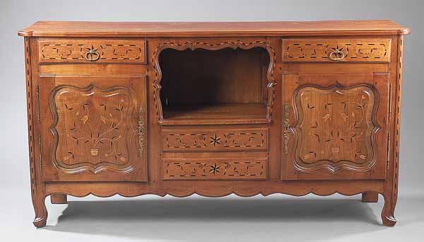 Appraisal: A French Provincial-Style Inlaid Buffet the shaped top central cubbyhole