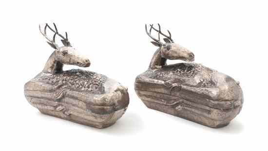 Appraisal: A Pair of Indian Silvered Metal Figural Boxes each in