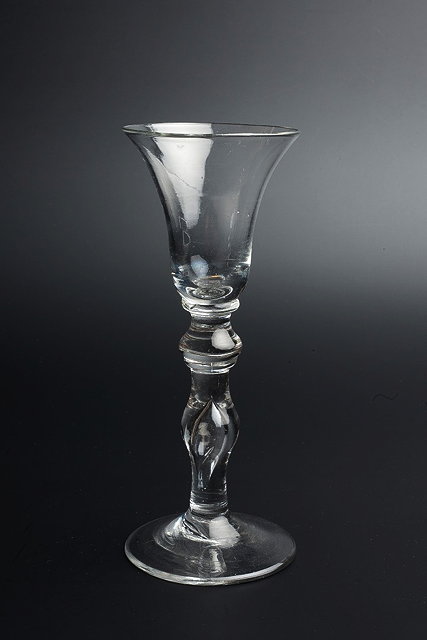 Appraisal: AN TH CENTURY WINE GLASS with flared trumpet shaped bowl