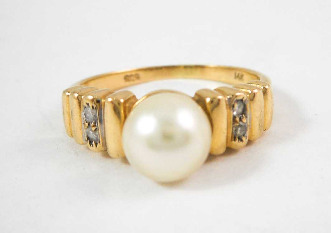 Appraisal: PEARL DIAMOND AND FOURTEEN KARAT GOLD RING set with four