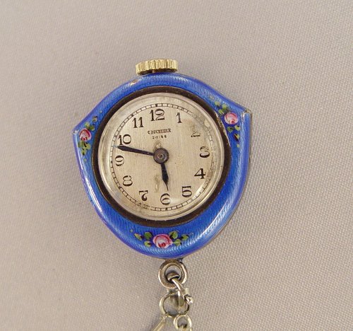 Appraisal: STERLING BUCHERER ENAMELED WATCH PENDANT AND CHAIN Sterling shield shaped