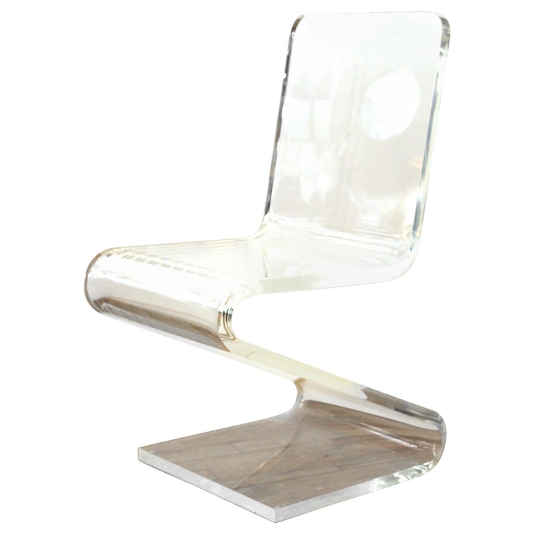 Appraisal: MODERN LUCITE 'Z' CANTILEVER CHAIR Modern Lucite 'Z' cantilever side