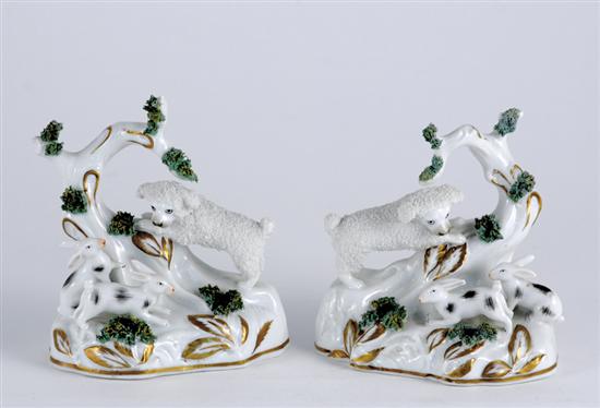 Appraisal: Pair English porcelain figurines circa matched pair depicting dog and