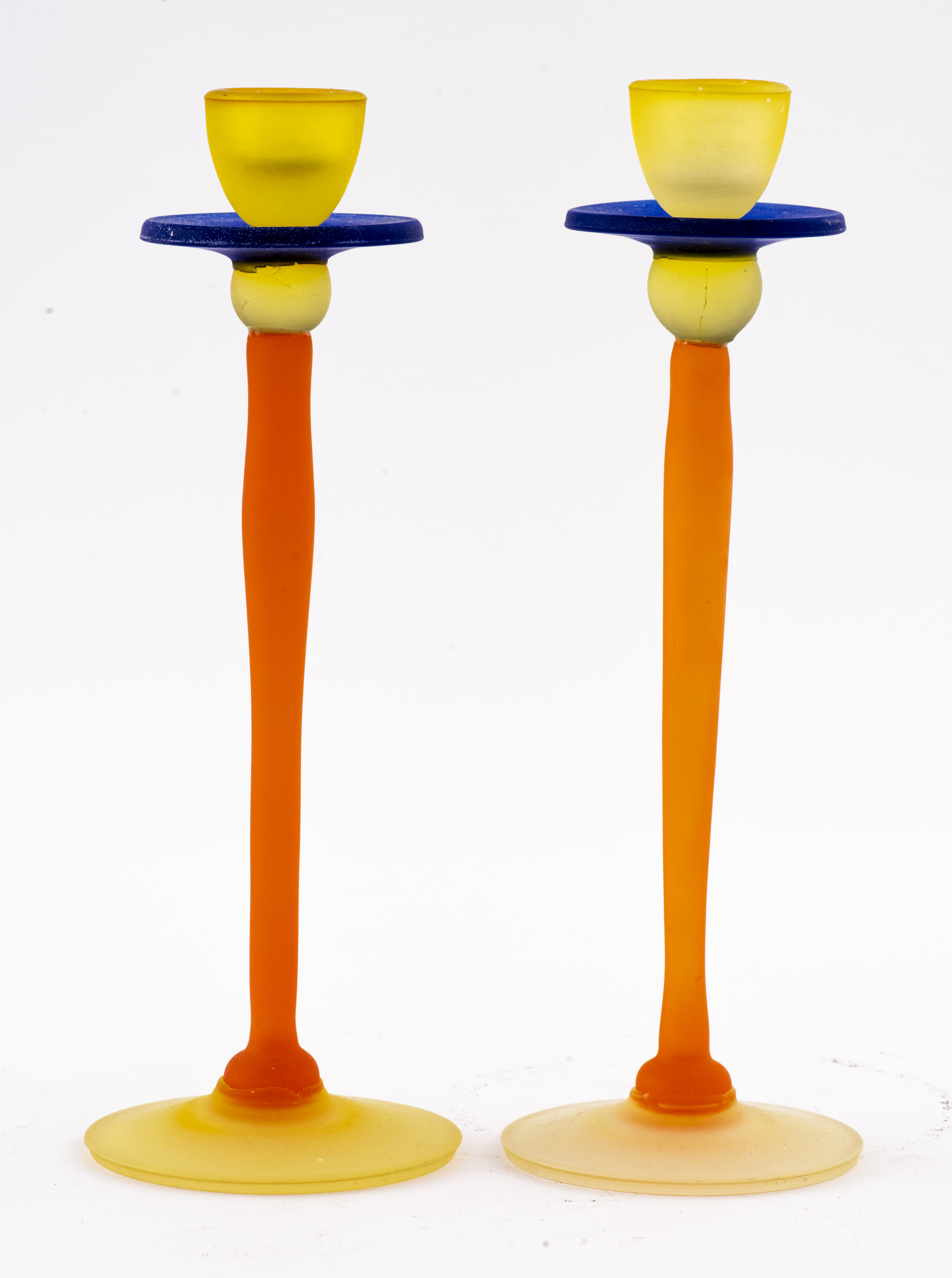 Appraisal: POSTMODERN MEMPHIS STYLE GLASS CANDLESTICKS Pair of Postmodern Memphis style