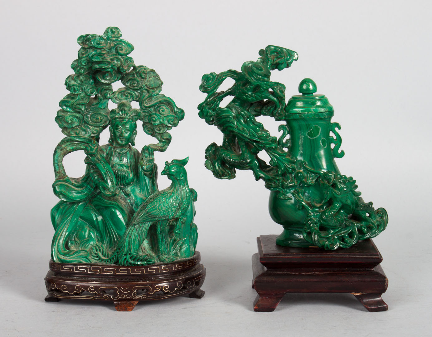 Appraisal: Two Chinese carved malachite groups urn with entwined dragons and