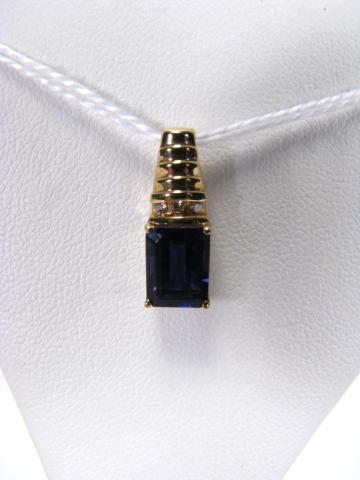 Appraisal: K yellow gold pendant set with rectangular-cut iolite having small