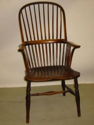 Appraisal: AN ASH AND ELM WINDSOR ARM CHAIR of high hoop