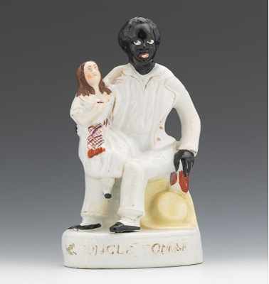 Appraisal: A Uncle Tom Eva Figural Seated Uncle Tom with Eva