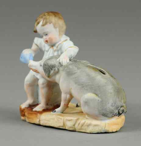 Appraisal: CHILD NURSING PIG STILL BANK Bisque c painted overall amusing