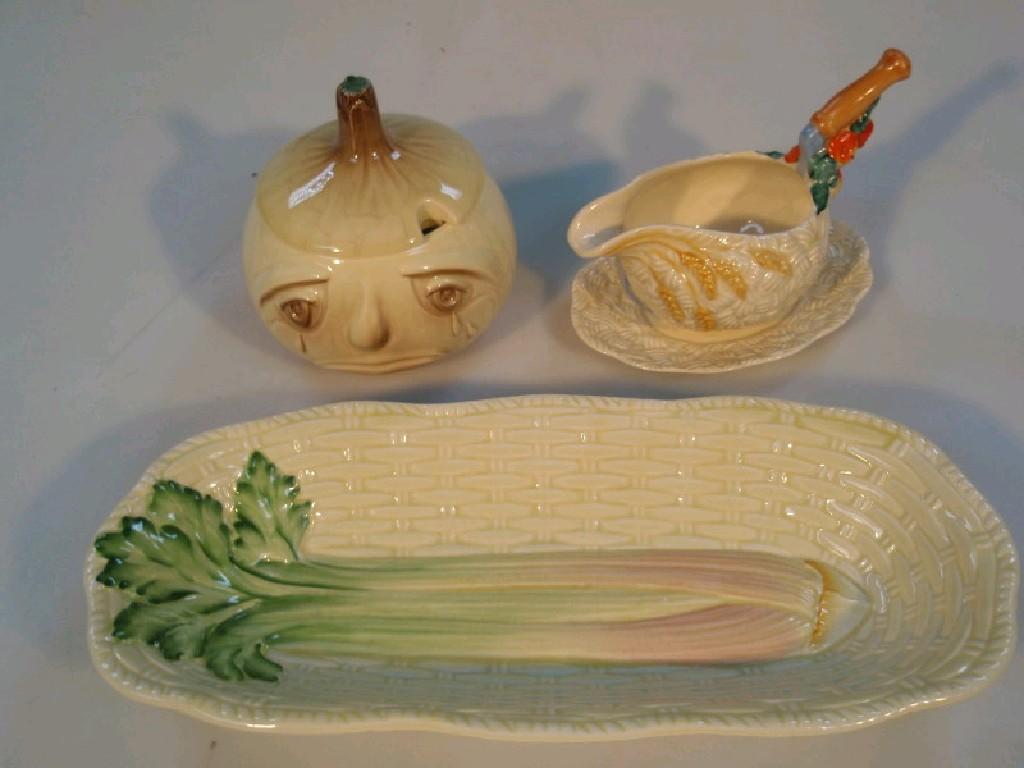 Appraisal: A Clarice Cliff Newport Pottery harvest sauce boat and stand