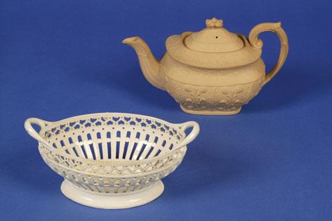 Appraisal: A LEEDS CREAMWARE OVAL PIERCED BASKET with twin side handles