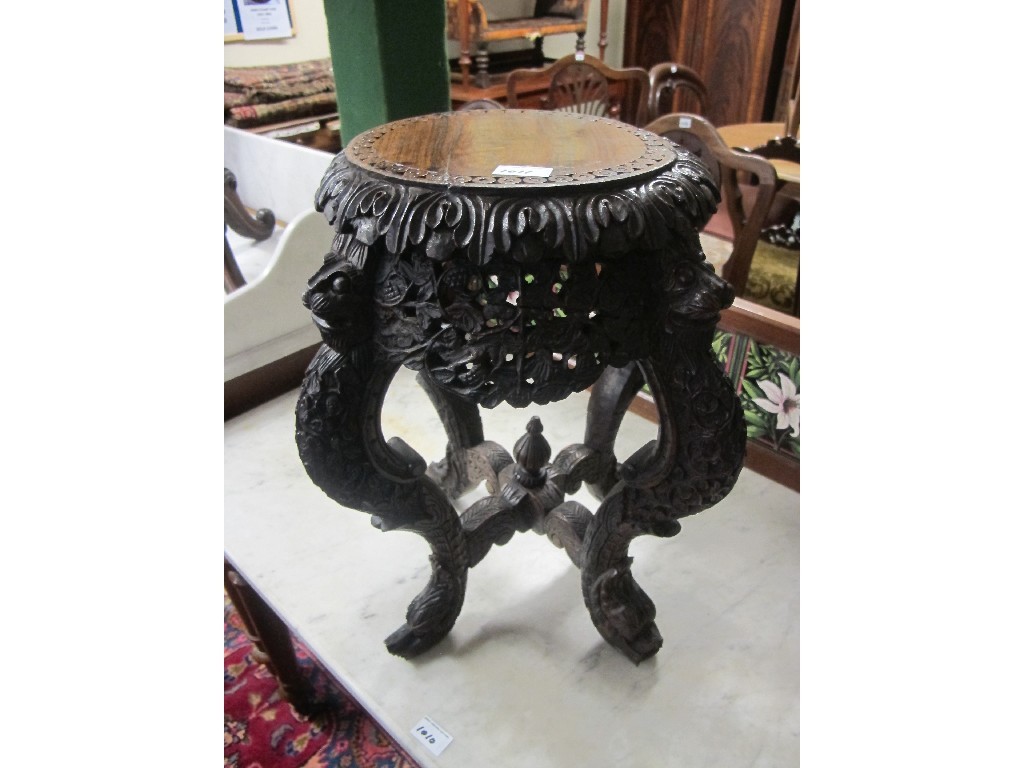 Appraisal: Eastern hardwood carved low table plant stand Provenance The Property