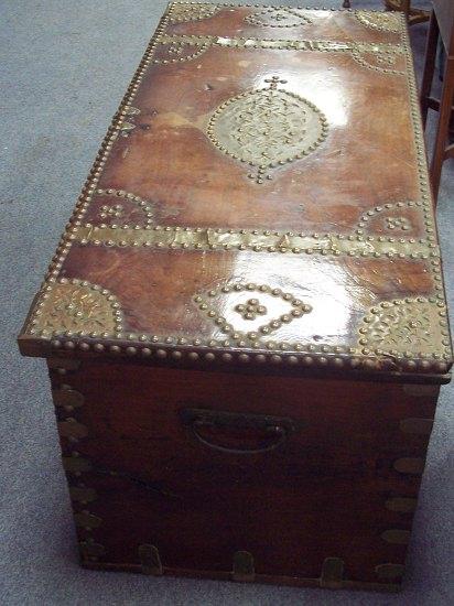 Appraisal: A cedarwood chest with brass studded and strapped decoration having