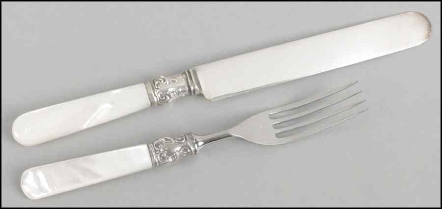 Appraisal: MOTHER-OF-PEARL AND STERLING SILVER HANDLED FLATWARE SERVICE Comprised of twelve