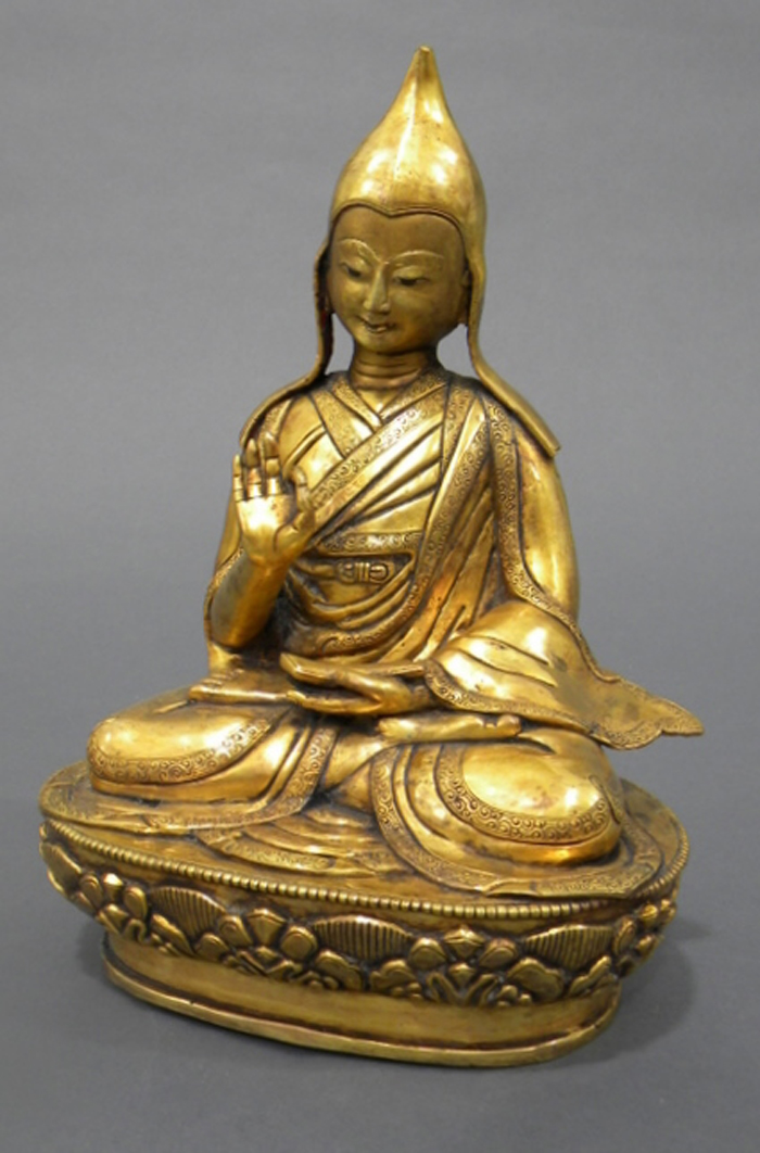 Appraisal: Gilt-bronze Portrait of a Lama Tibet seated in dhyanasana pose