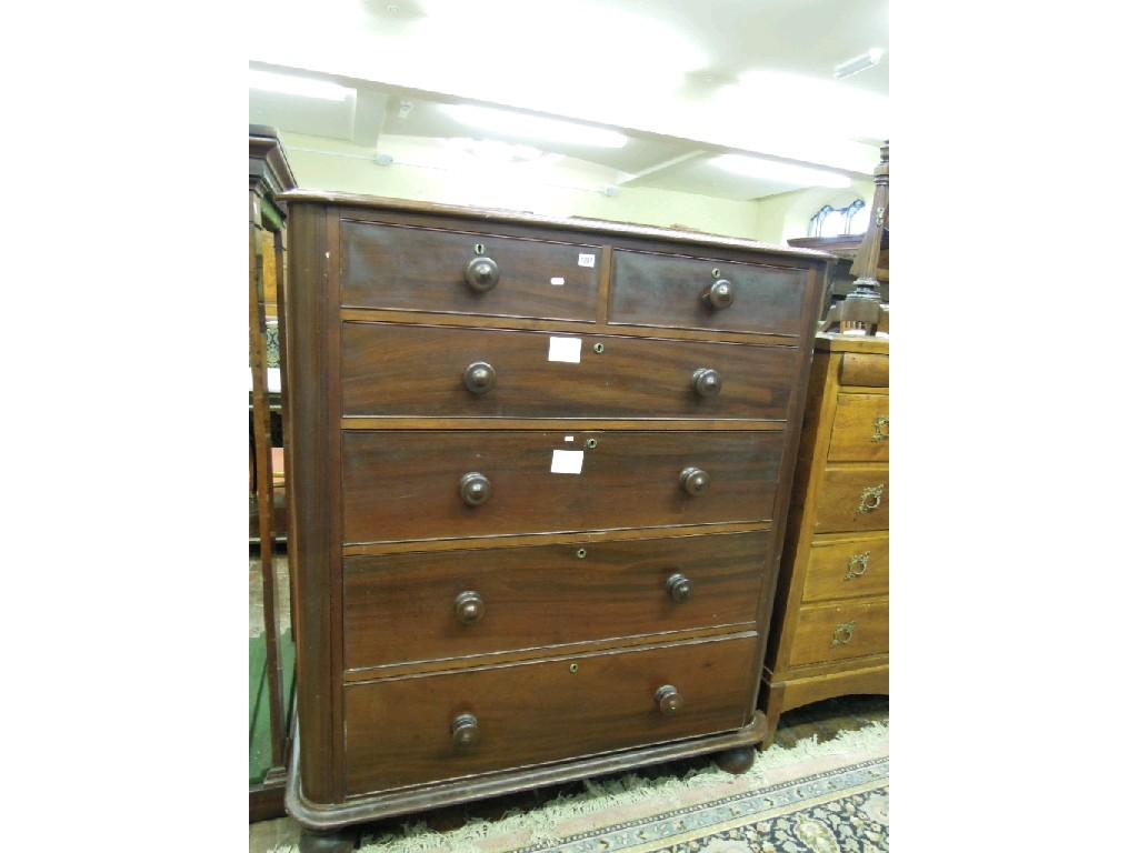 Appraisal: A Victorian mahogany chest fitted with an arrangement of four