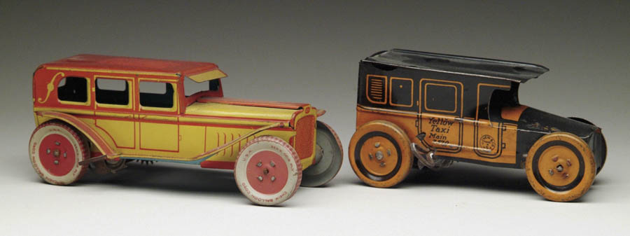 Appraisal: LOT OF TWO CHEIN VEHICLES To include a windup yellow