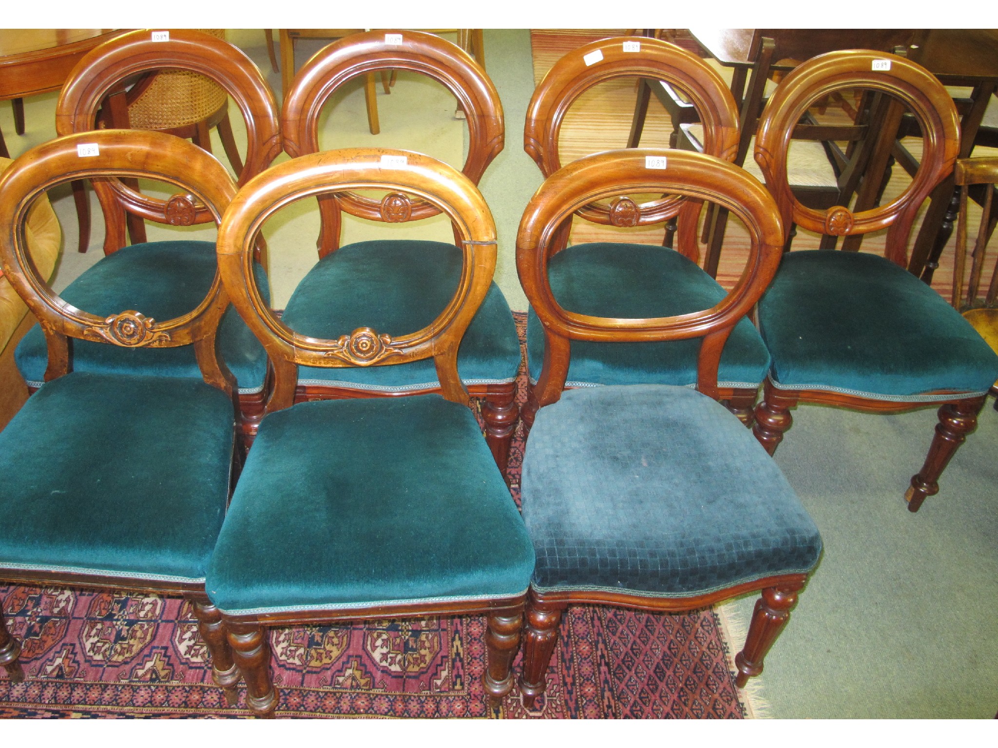 Appraisal: Seven Victorian mahogany balloon back chairs