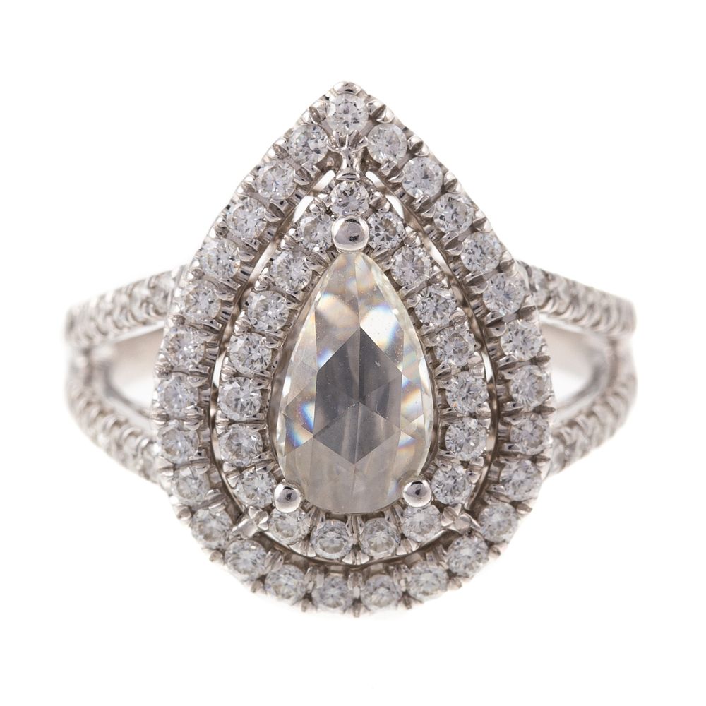 Appraisal: A Pear Shape Rose Cut Diamond Halo Ring in K