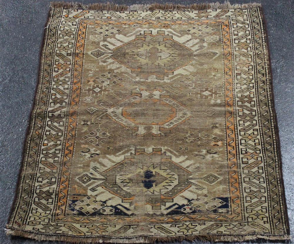 Appraisal: CAUCASIAN SOUMAK WOOL RUG having abstract medallions on a brown