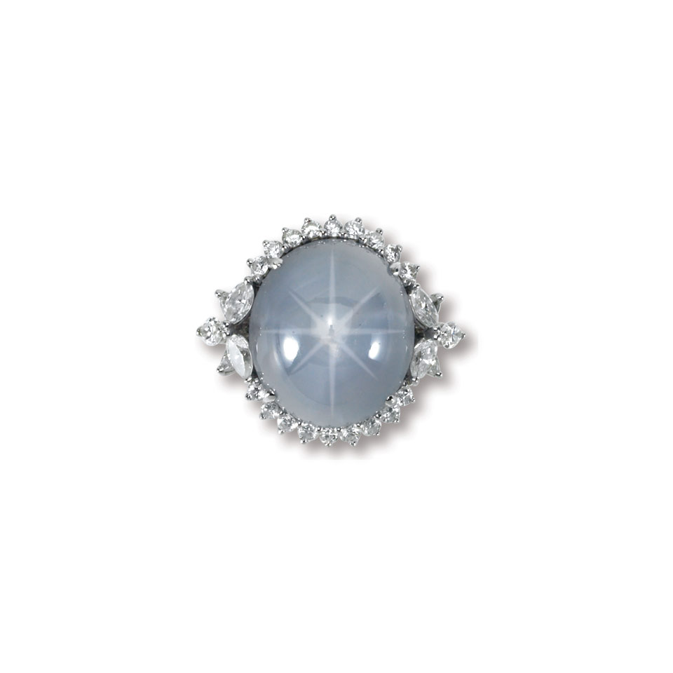 Appraisal: Platinum Cocktail Ring set with an oval star sapphire cabochon