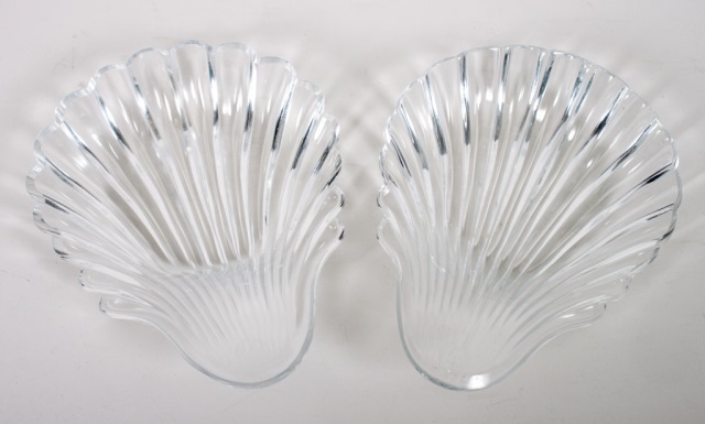 Appraisal: Seven Baccarat crystal shell dishes modeled as clamshell halves acid