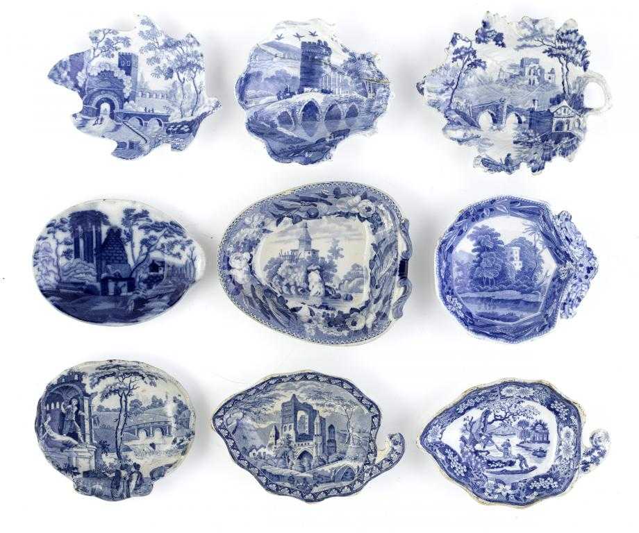 Appraisal: NINE BLUE PRINTED EARTHENWARE PICKLE DISHES of leaf shell or