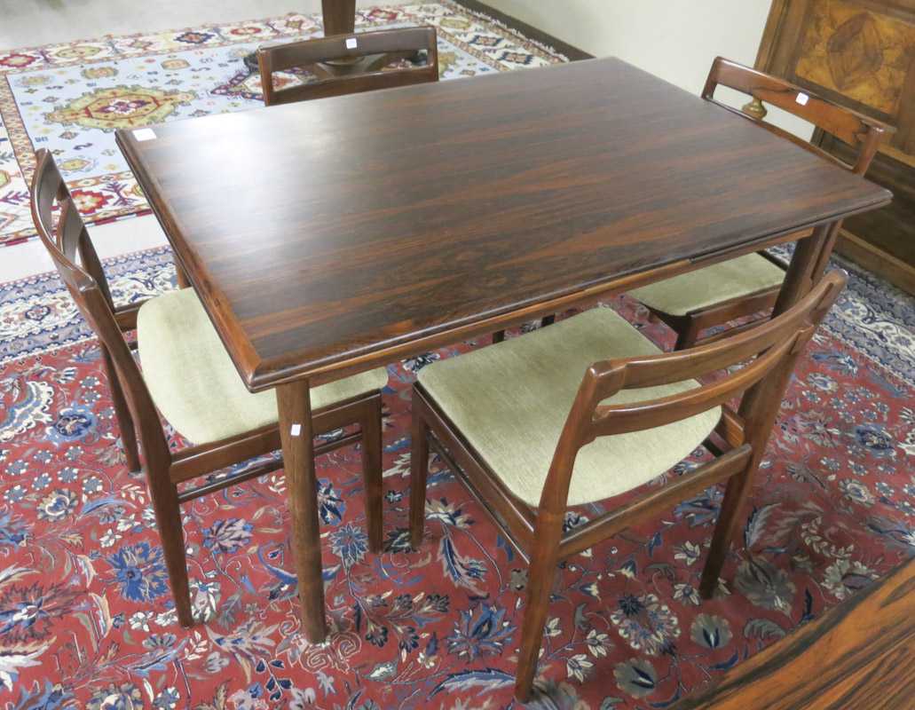 Appraisal: DANISH MODERN ROSEWOOD DINING TABLE AND CHAIR SET featuring a