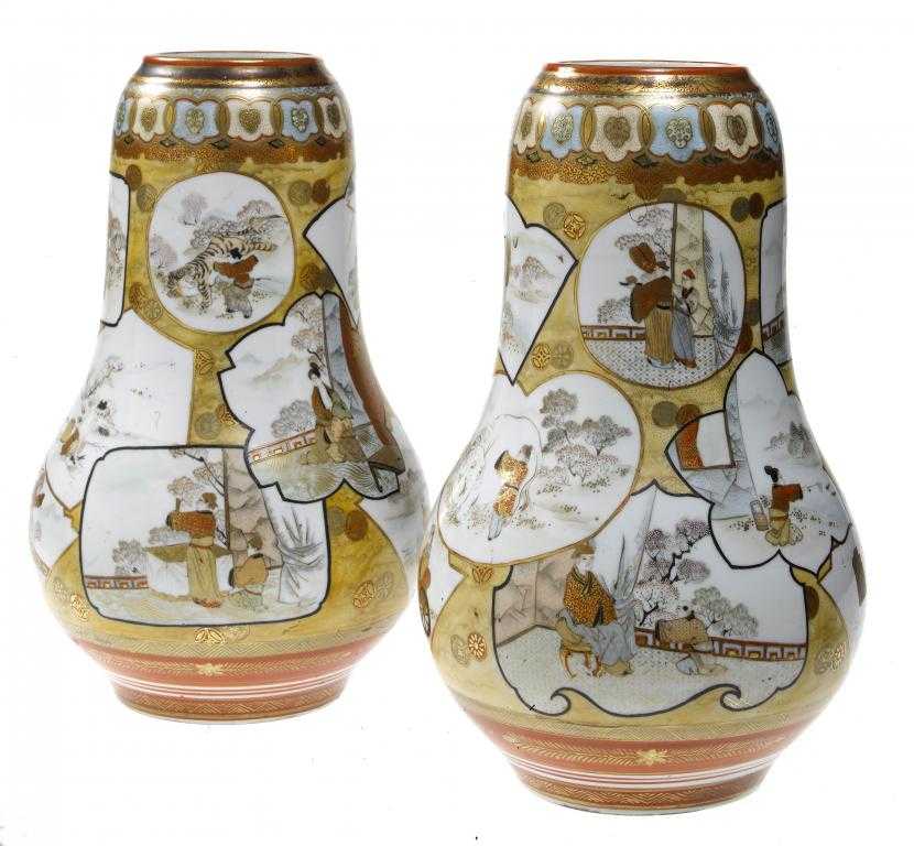 Appraisal: A PAIR OF KUTANI VASES of pear shape enamelled with