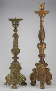 Appraisal: Neoclassical candlesticks bronze wood Two Neoclassical trifurcated baluster-form candlesticks the