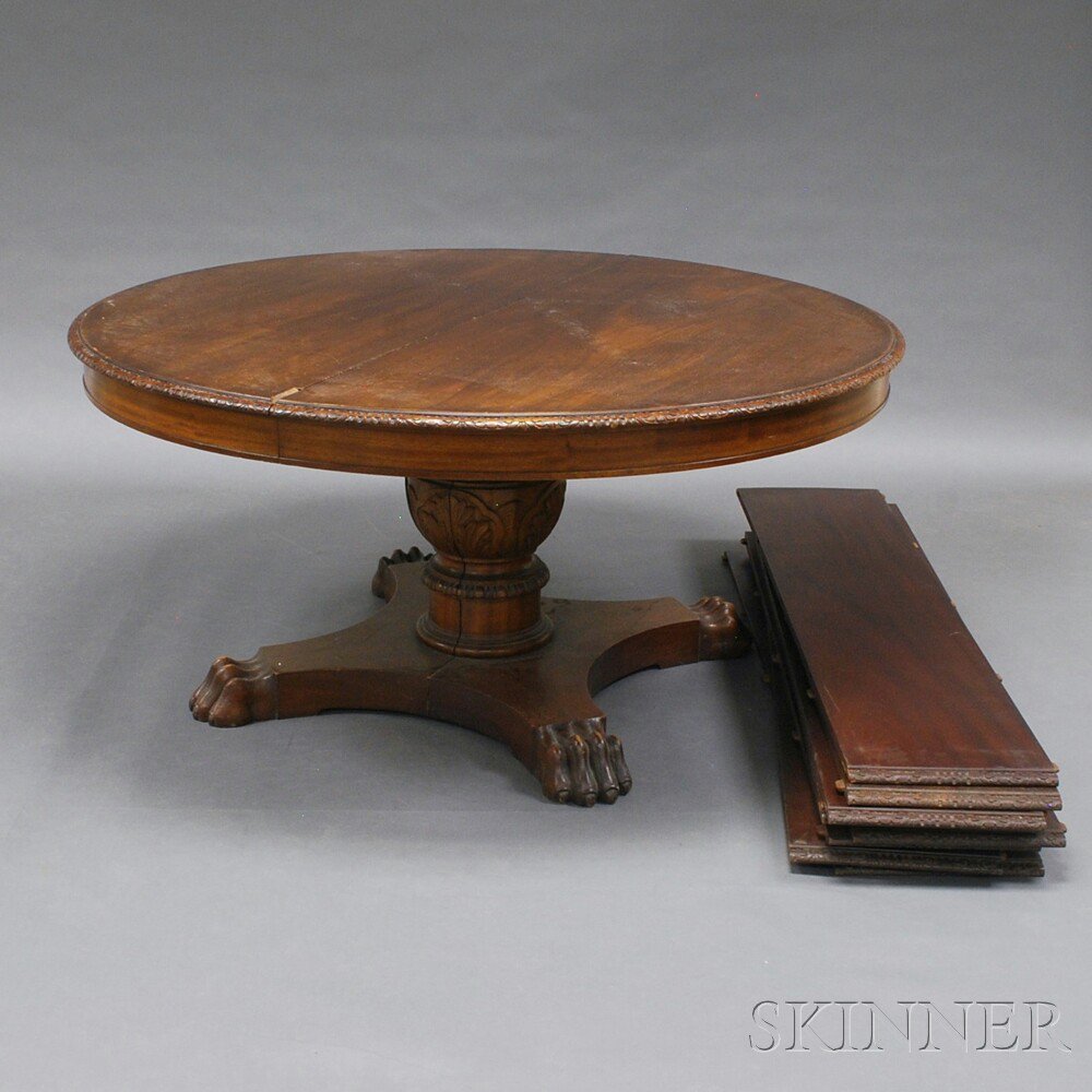 Appraisal: Carved Mahogany Pedestal Table and Eight Leaves the circular top