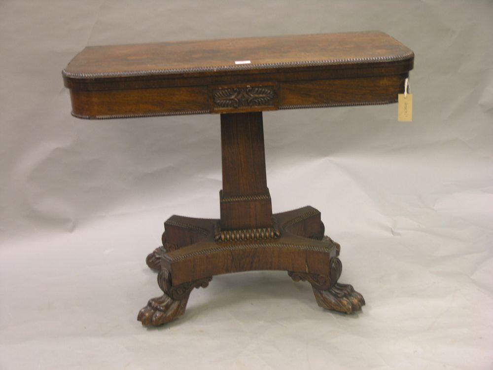 Appraisal: A William IV rosewood card table 'D' shape top with