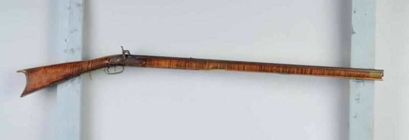 Appraisal: Muzzleloader w Striped Barrel Description This percussion Kentucky rifle has