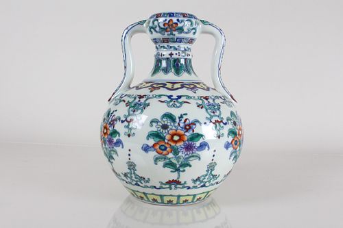 Appraisal: A CHINESE DUO-HANDLED NATURE-SCEEN PORCELAIN FORTUNE VA A Chinese Duo-handled