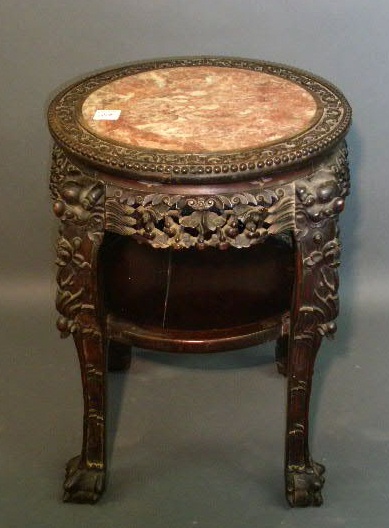 Appraisal: Oriental ebonized plant stand with marble top h x diam