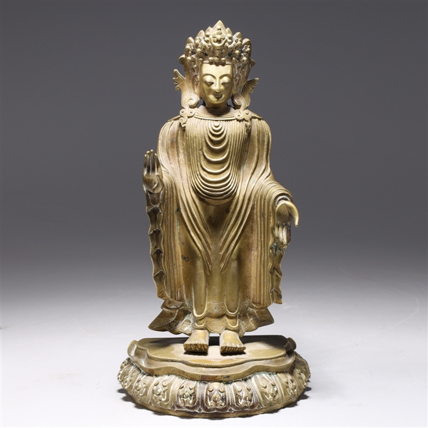 Appraisal: Chinese bronze standing statue of Buddha with elaborate robes on